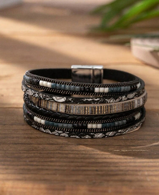 Multilayered Black Bracelet with White, Blue, and Silver Accents