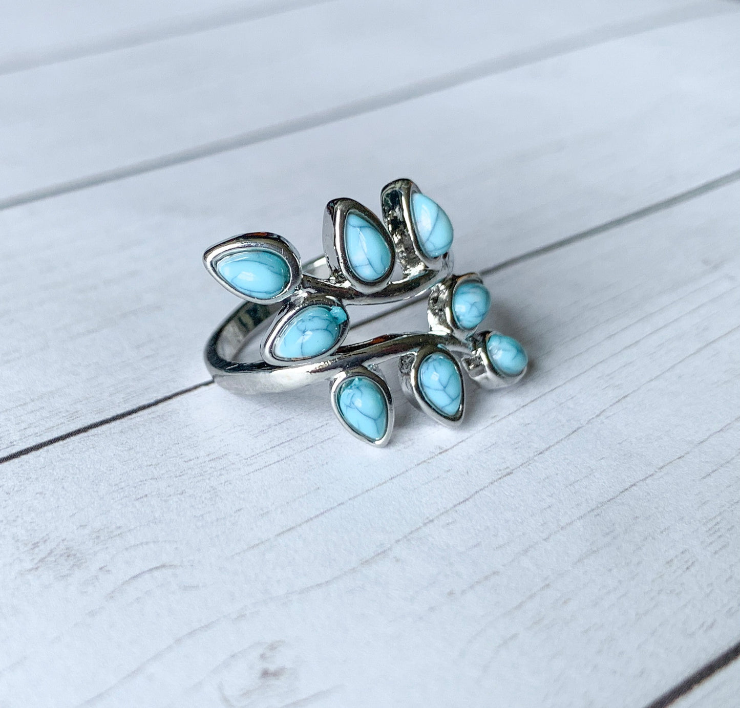 Gorgeous Ring with Turquoise Teardrop Shaped Stones